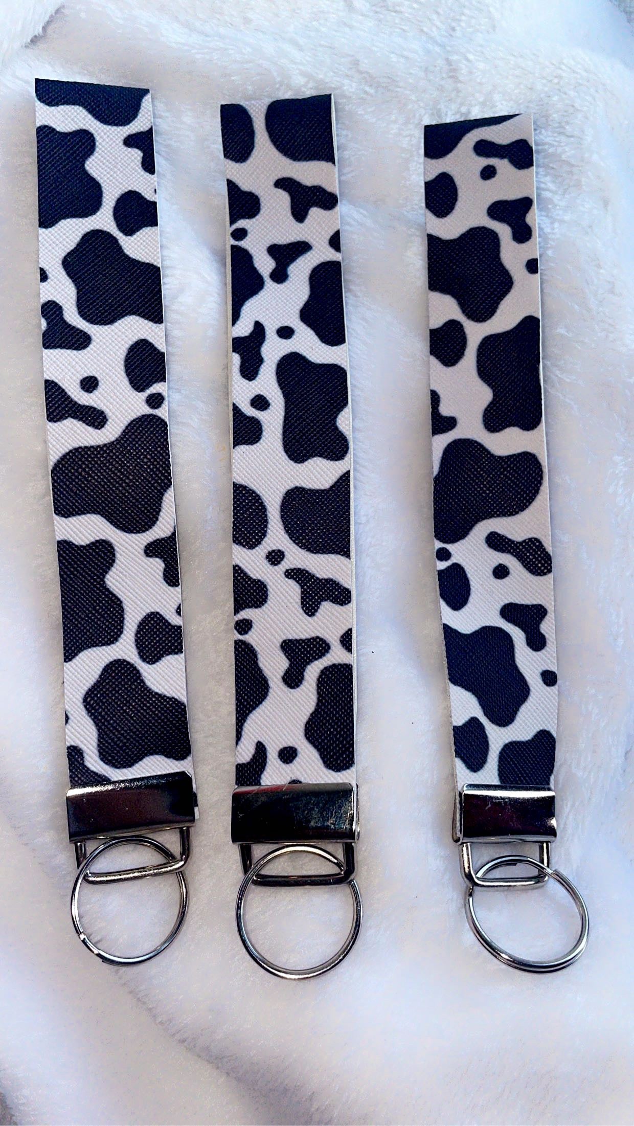 Cow print wristlet