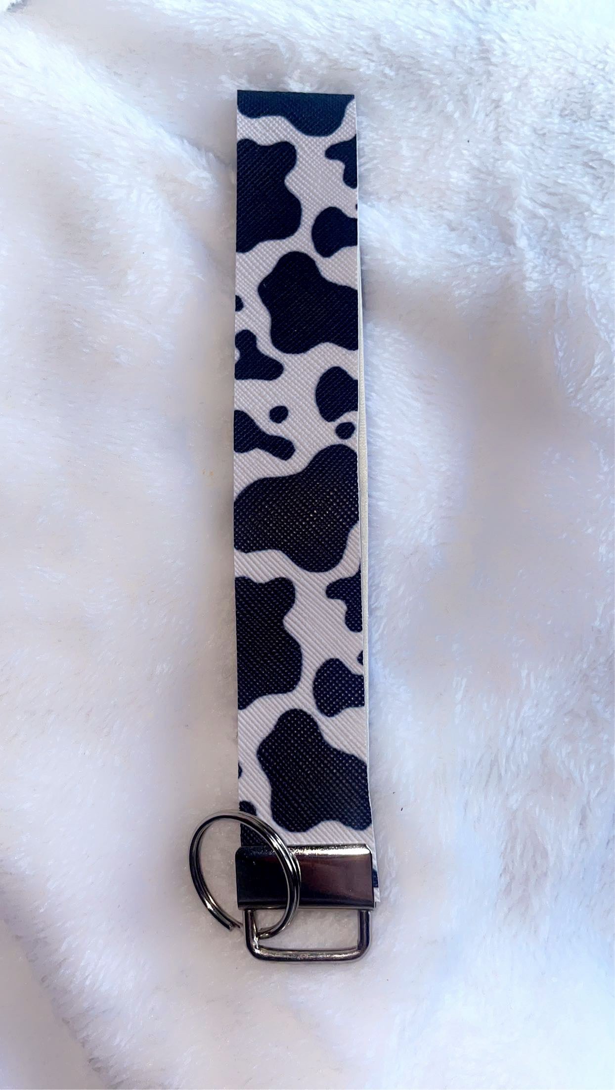 Cow print wristlet