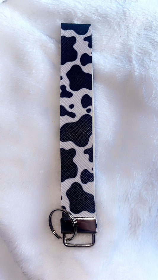 Cow print wristlet