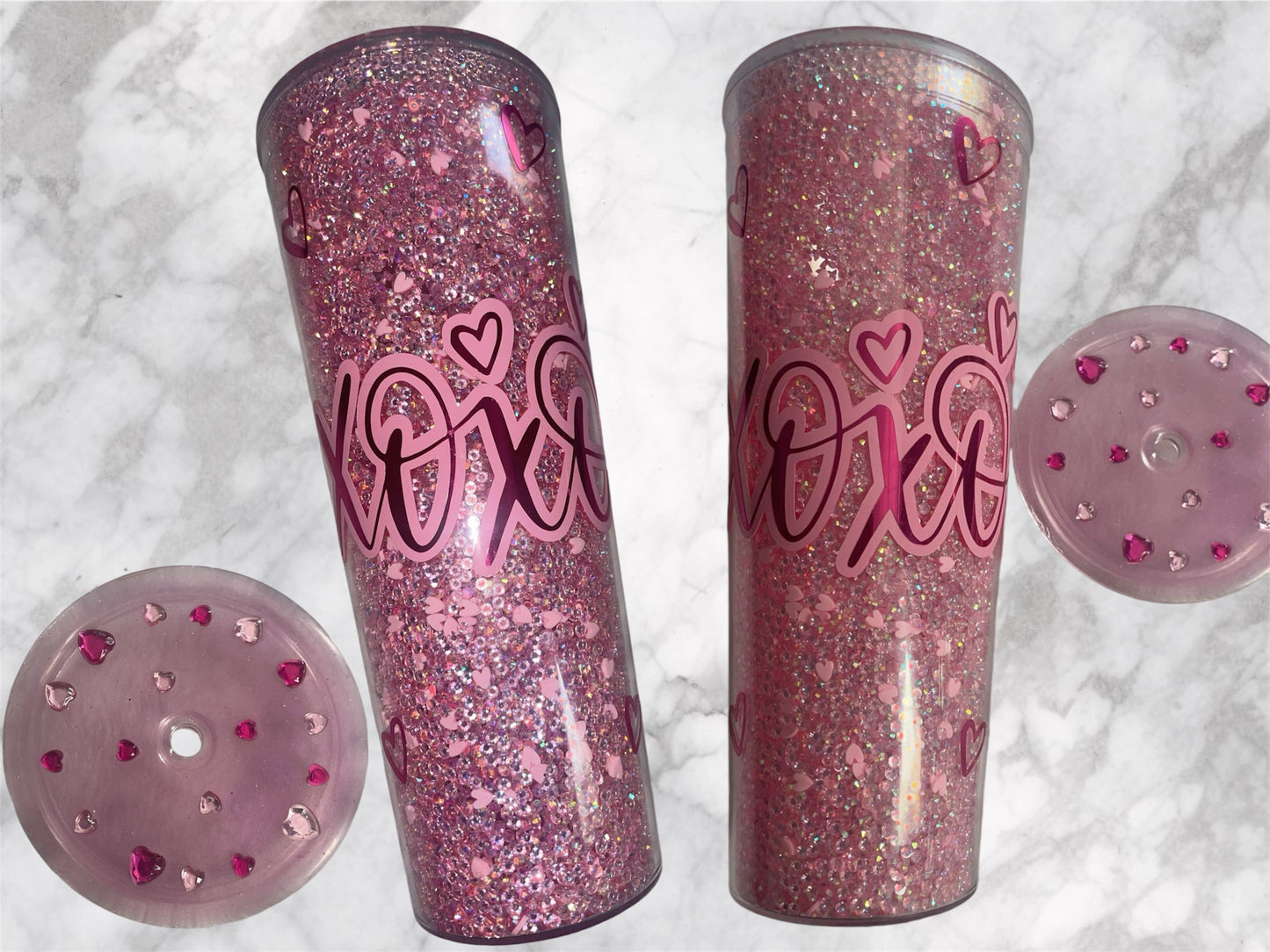 Hugs and kisses xoxo rhinestoned filled tumbler with vinyl decal.